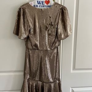 Gold sequin cocktail dress.